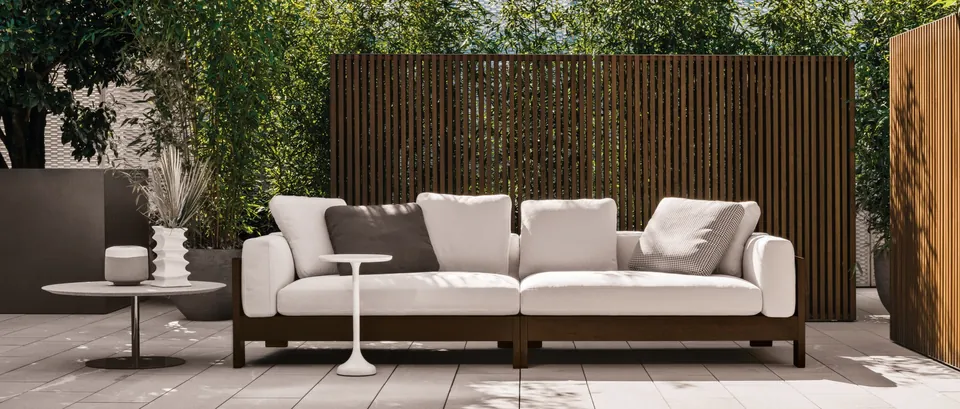 Minotti Alison iroko outdoor sofa on a terrace, Minotti outdoor furniture