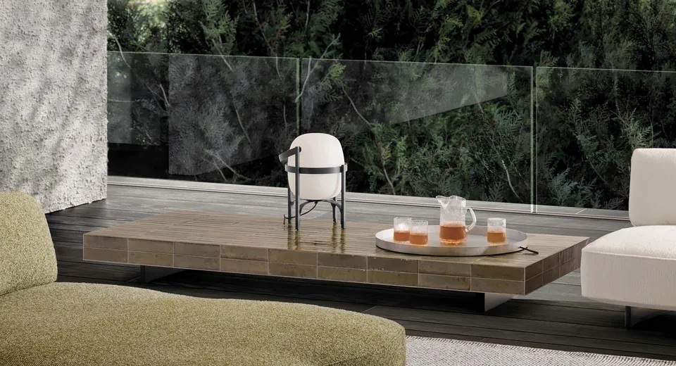 Minotti Andrée tiled outdoor dining table on a terrace, Minotti outdoor furniture