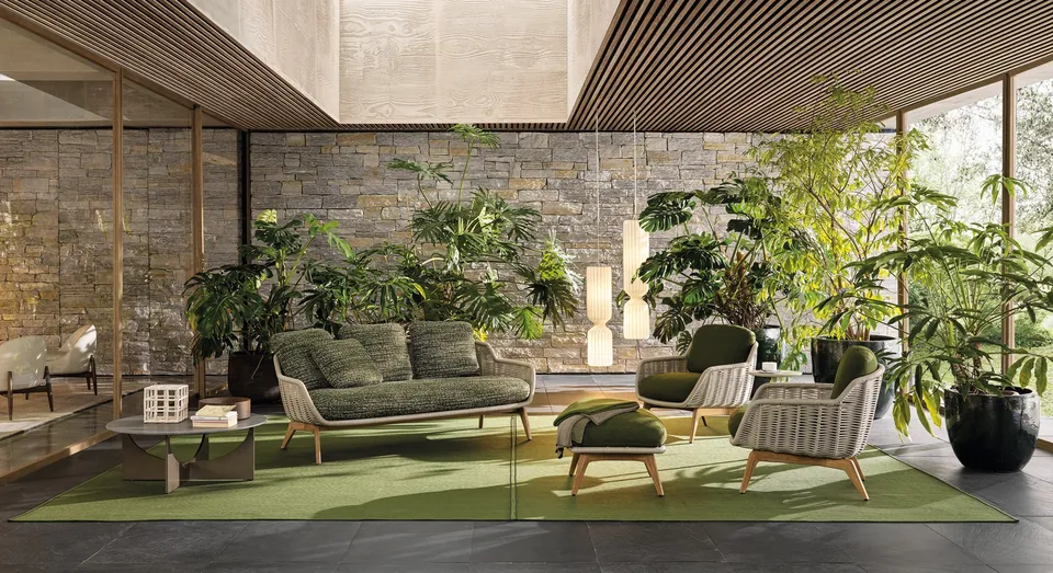 Minotti Belt Cord outdoor sofa with cord-wrapped frame on a terrace, Minotti outdoor furniture