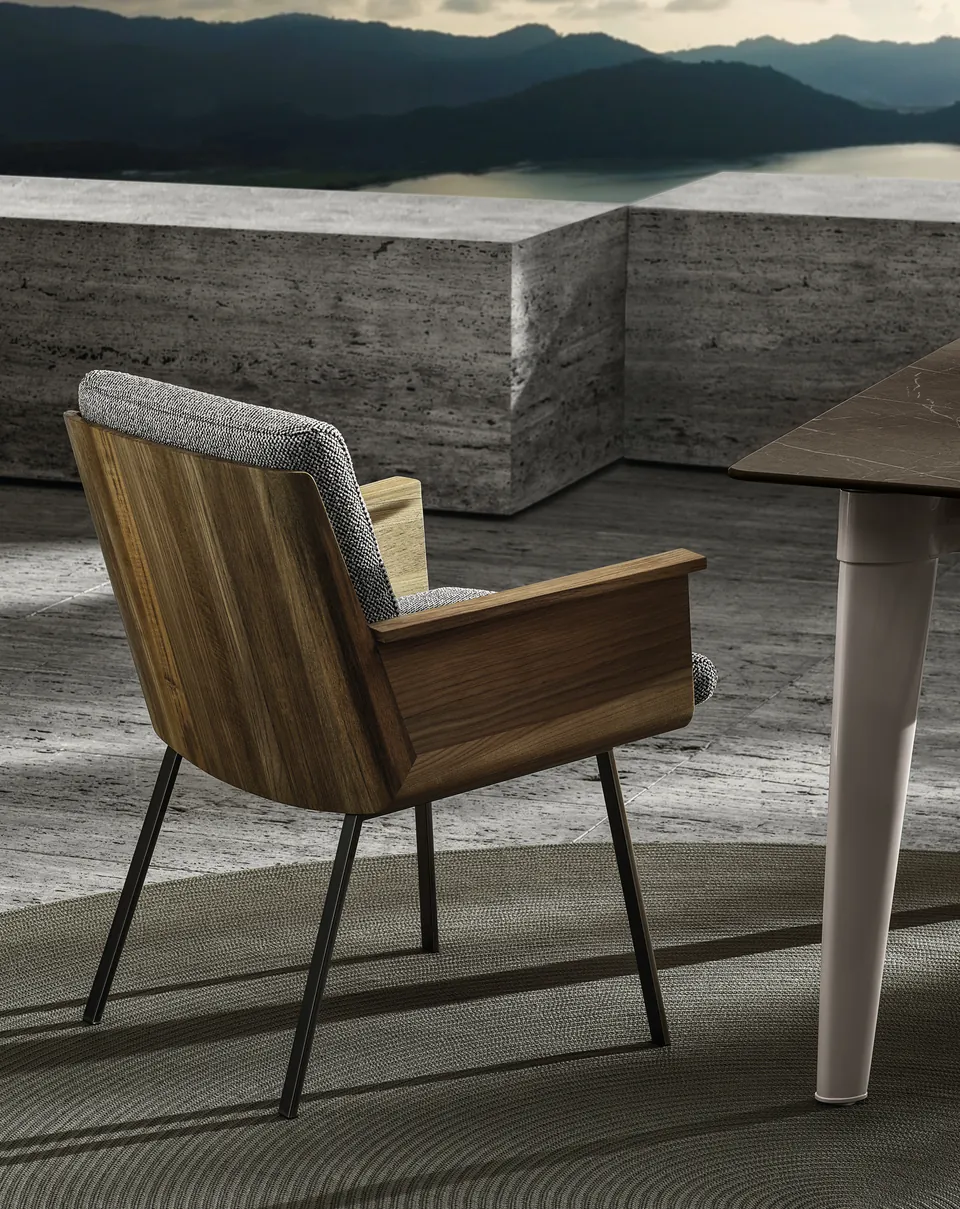 Minotti Daiki armchair with curved teak shell, catalog photograph