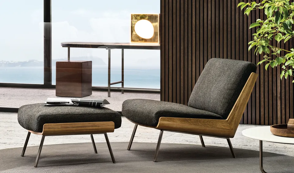 Minotti Daiki teak outdoor armchair on a terrace, Minotti outdoor furniture