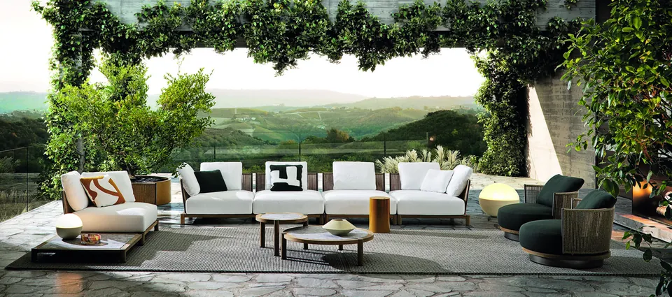 Minotti Daylight modular outdoor sofa on teak feet on a terrace, Minotti outdoor furniture