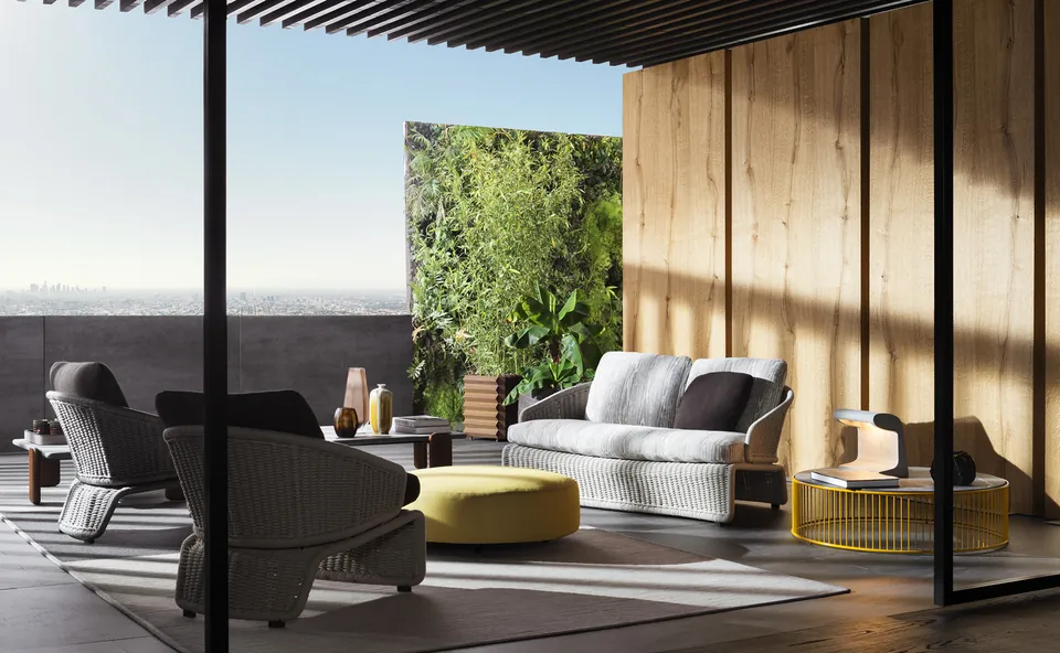 Minotti Halley armchair with cord-wrapped frame, catalog photograph