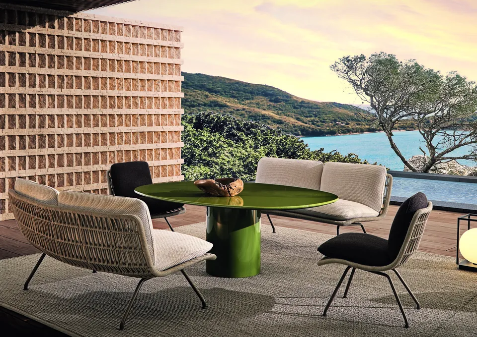 Minotti Pattie Cord armchair with footstool, catalog photograph