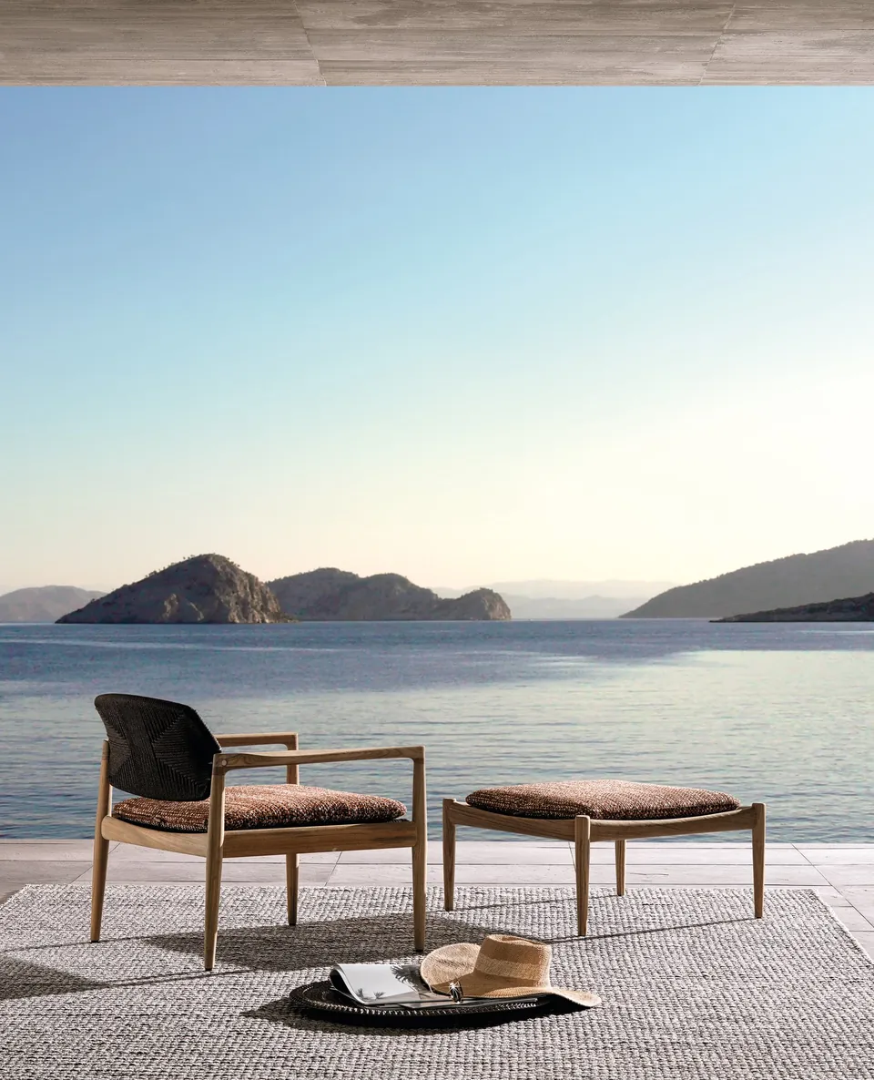 Minotti Yoko Cord teak outdoor chairs facing the water, Minotti outdoor furniture