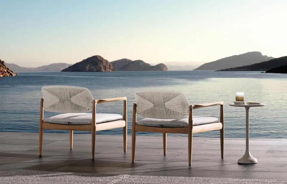 Minotti Yoko Cord teak outdoor armchair with strung cord seat on a terrace, Minotti outdoor furniture